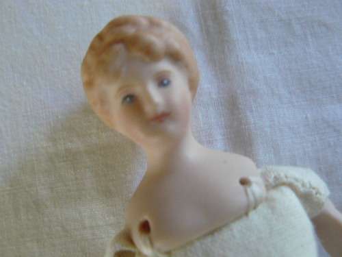 VINTAGE HAND PAINTED PORCELAIN AND MATERIAL DOLL 14 CM
