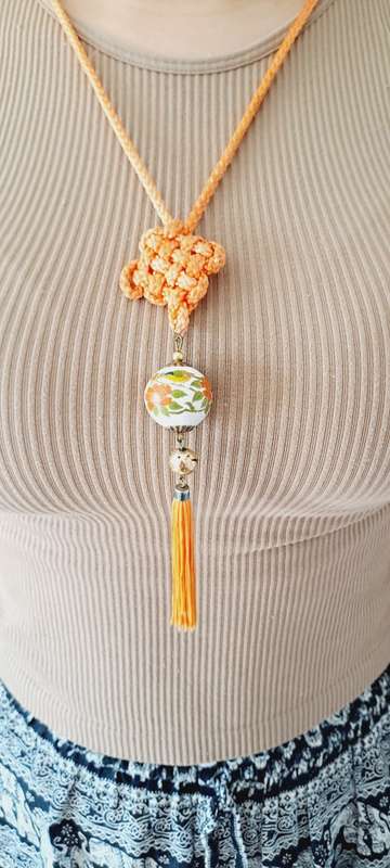 very prettu porcelain and hand painted long necklace