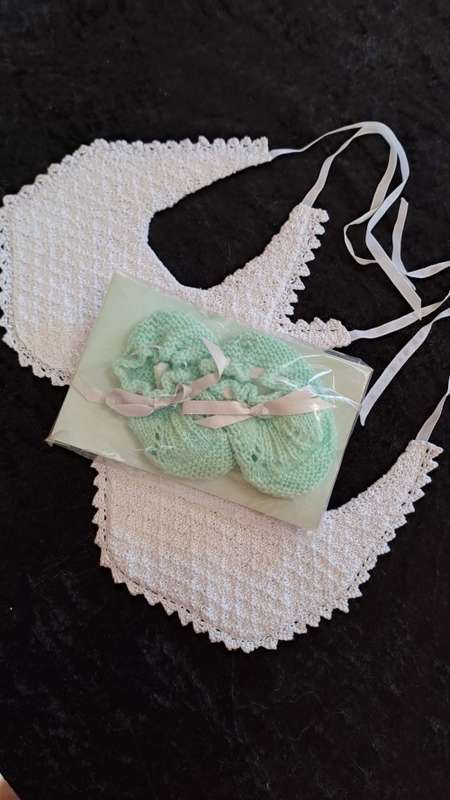 2 double layer vintage crotcheted cotton bibs and a pair of booties