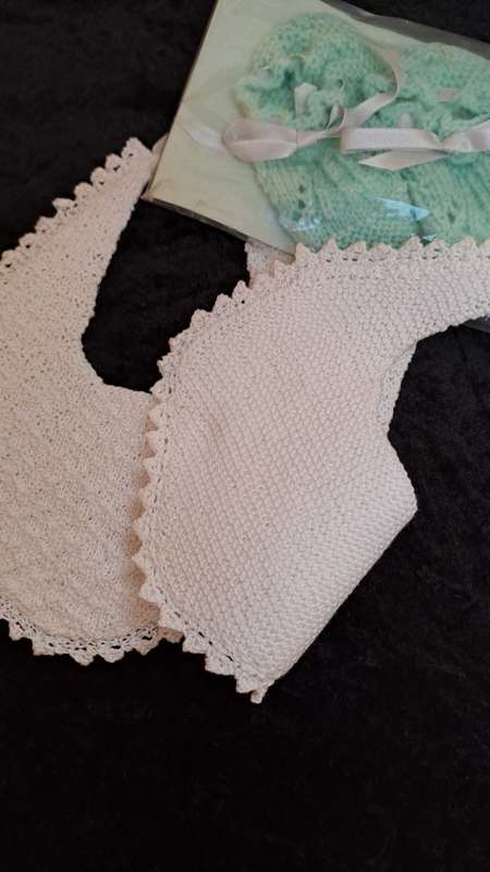 2 double layer vintage crotcheted cotton bibs and a pair of booties