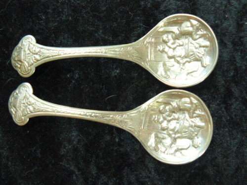 2 X SILVER TONED SPOONS VERY PRETTY AND DETAILED