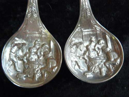 2 X SILVER TONED SPOONS VERY PRETTY AND DETAILED