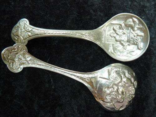 2 X SILVER TONED SPOONS VERY PRETTY AND DETAILED