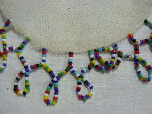 VINTAGE BEADED NET JUG COVER