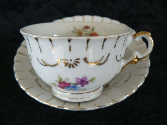 PORCELAIN CUP AND SOUCER