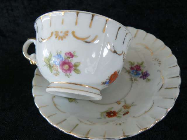 PORCELAIN CUP AND SOUCER