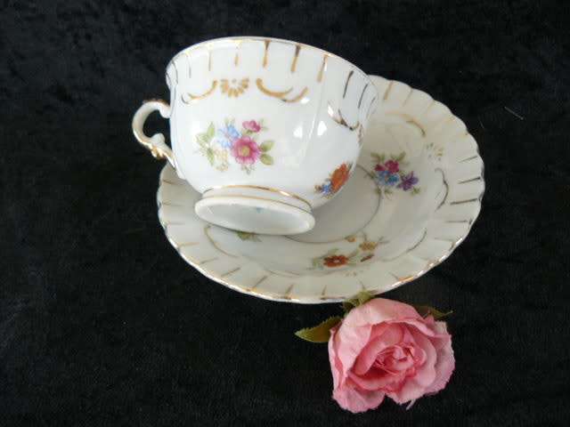 PORCELAIN CUP AND SOUCER