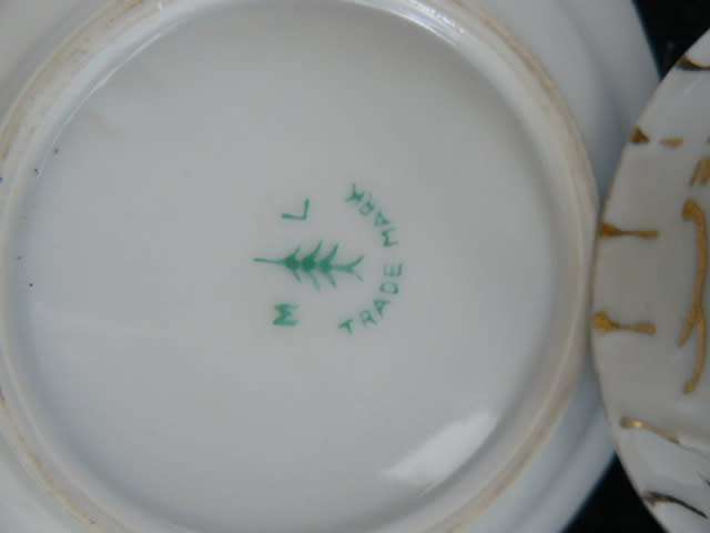 PORCELAIN CUP AND SOUCER