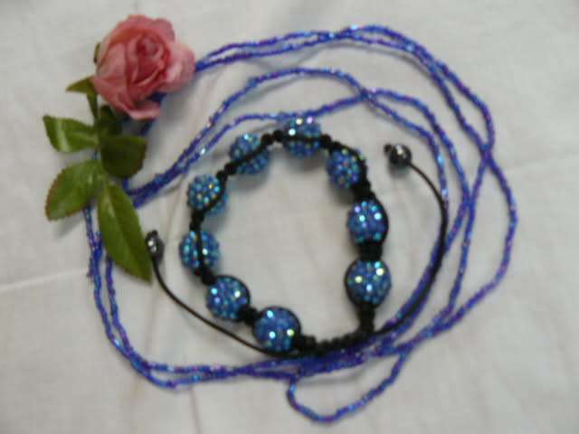 ADJUSTABLE BANGLE AND LONG STRING OF BEADS