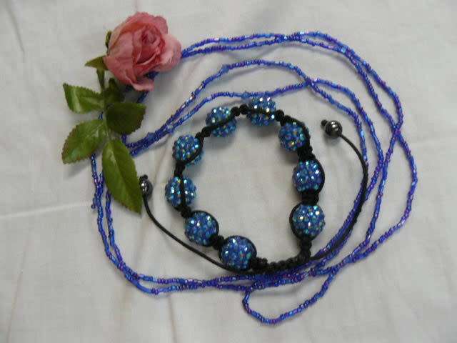 ADJUSTABLE BANGLE AND LONG STRING OF BEADS