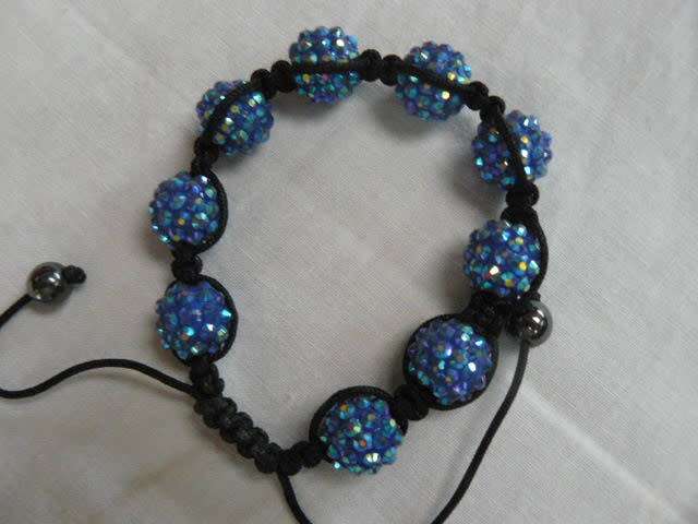 ADJUSTABLE BANGLE AND LONG STRING OF BEADS