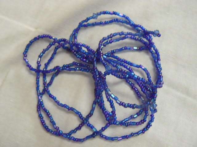 ADJUSTABLE BANGLE AND LONG STRING OF BEADS