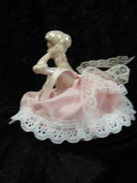 PORCELAIN DOLL