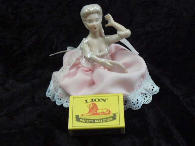 PORCELAIN DOLL