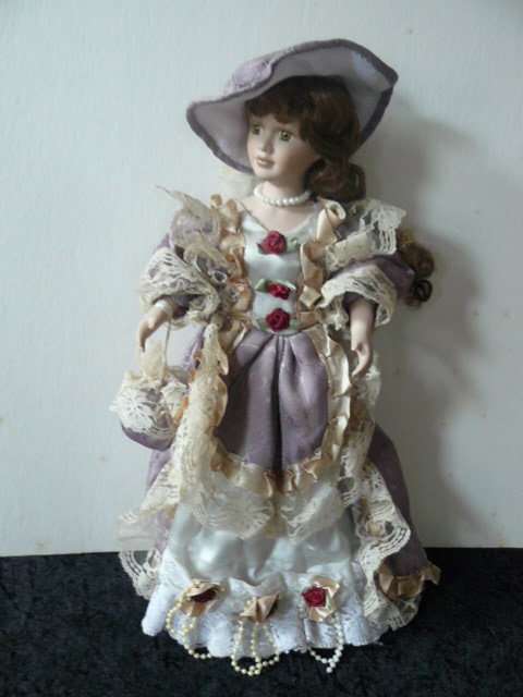 VINTAGE PORCELAIN DOLL