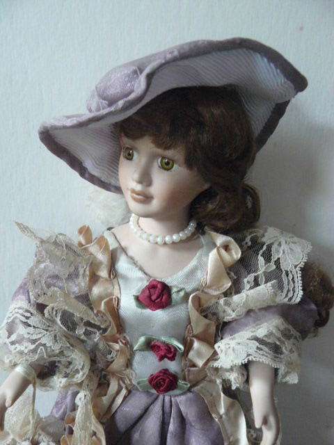 VINTAGE PORCELAIN DOLL