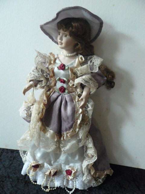 VINTAGE PORCELAIN DOLL