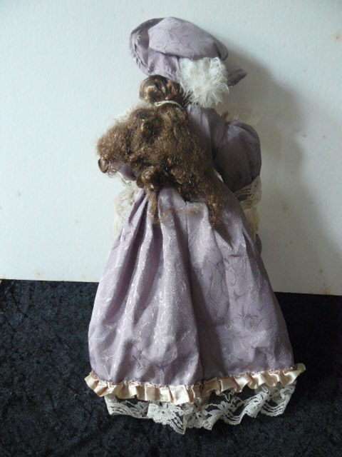 VINTAGE PORCELAIN DOLL