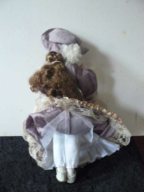 VINTAGE PORCELAIN DOLL
