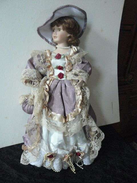 VINTAGE PORCELAIN DOLL