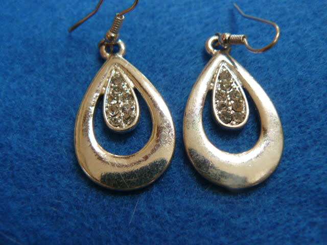 STUNNING SILVER TONED FASHION EARRINGS WITH A BIT OF BLING