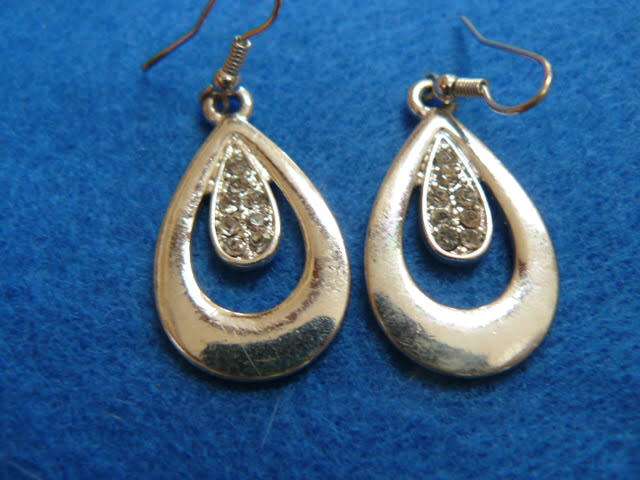 STUNNING SILVER TONED FASHION EARRINGS WITH A BIT OF BLING