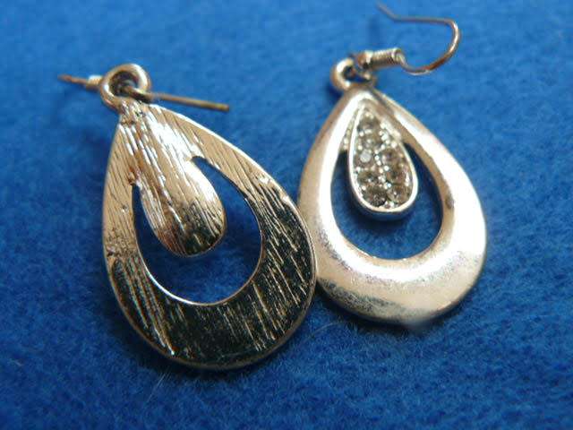 STUNNING SILVER TONED FASHION EARRINGS WITH A BIT OF BLING