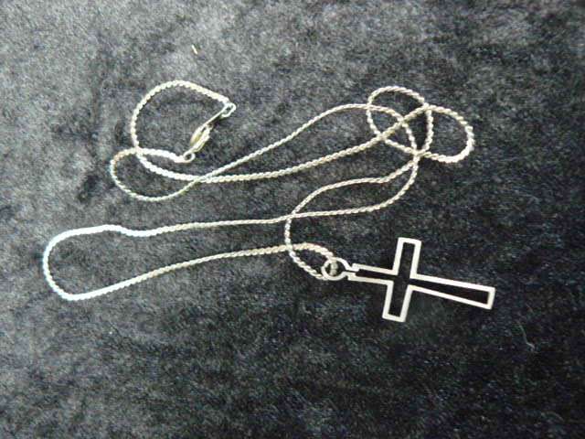 CROSS ON SILVER TONED CHAIN