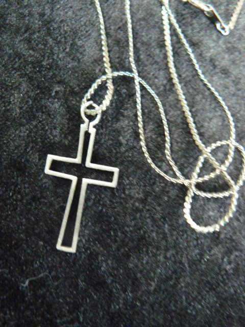 CROSS ON SILVER TONED CHAIN