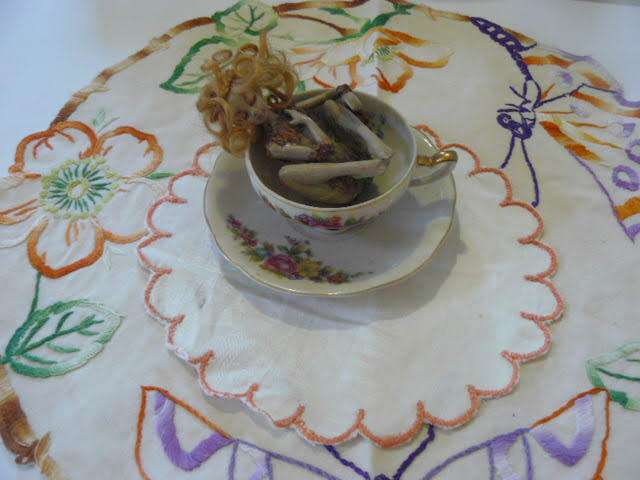 RESIN FAIRY IN CUP WITH SOUCHER