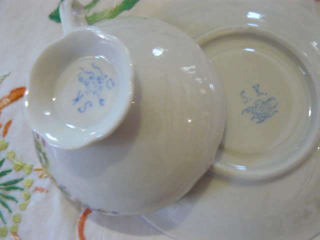 RESIN FAIRY IN CUP WITH SOUCHER
