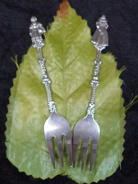SILVER TONED PICKLE FORKS
