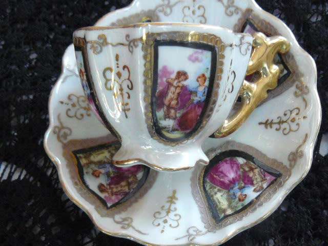 VINTAGE CUP AND SAUCER