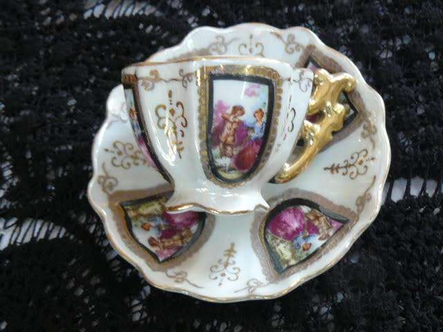VINTAGE CUP AND SAUCER