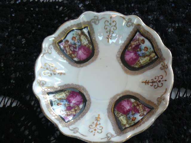 VINTAGE CUP AND SAUCER