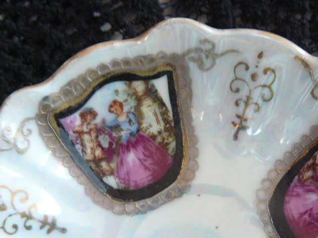 VINTAGE CUP AND SAUCER