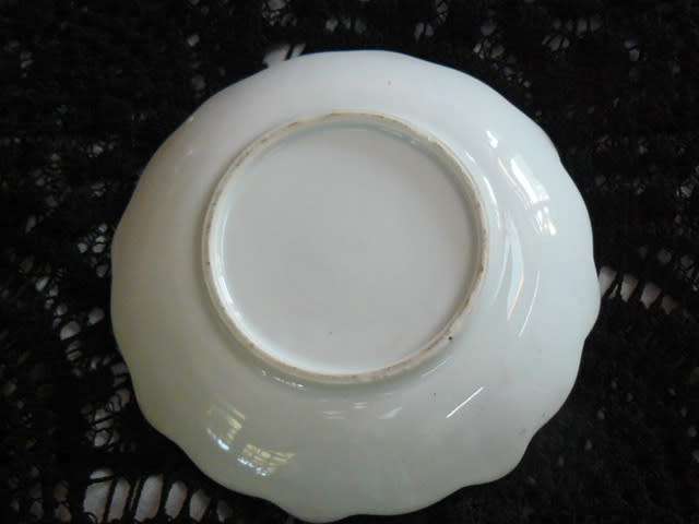 VINTAGE CUP AND SAUCER