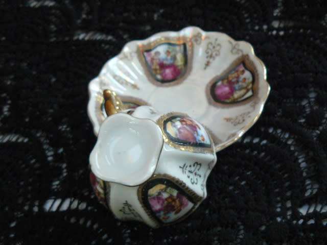 VINTAGE CUP AND SAUCER