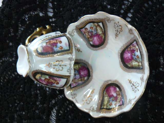 VINTAGE CUP AND SAUCER