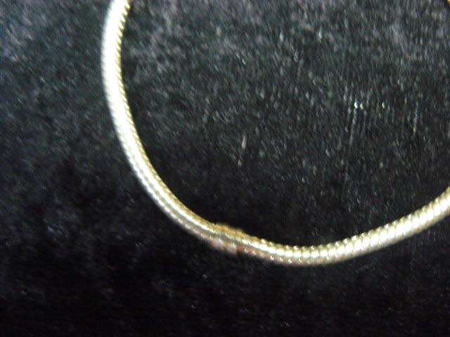 BRACELET SILVER TONED WITH 3 LIKE LOVE KNOTS