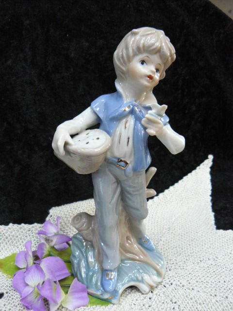 CERAMIC BOY FIGURINE ORNAMENT