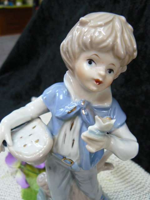 CERAMIC BOY FIGURINE ORNAMENT