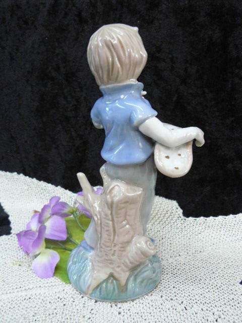 CERAMIC BOY FIGURINE ORNAMENT