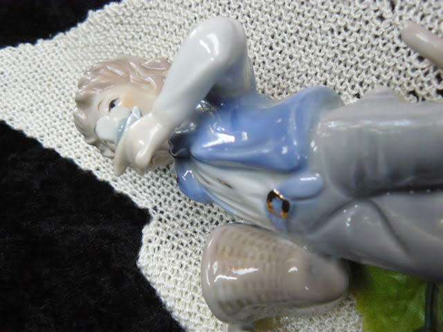 CERAMIC BOY FIGURINE ORNAMENT