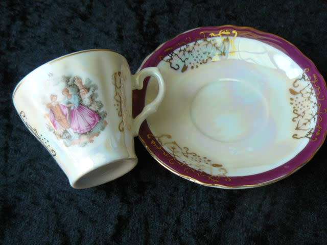 LIMOGES LIKE COFFEE CUP AND SOUCER WITH MOTHE OF PEARL EFFECT