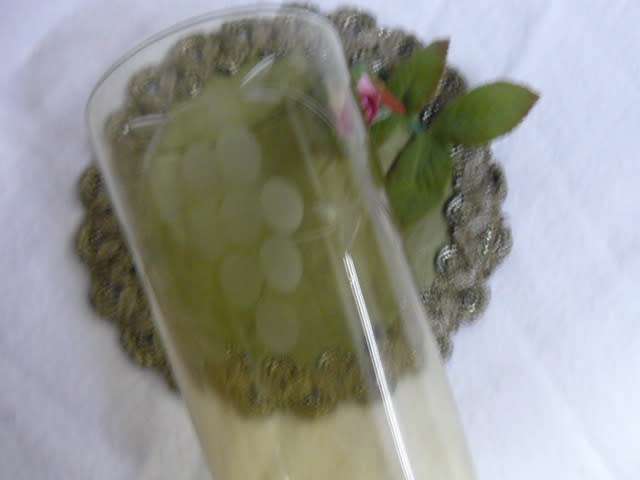 GLASS VASE BROWNISH WITH PATTERN
