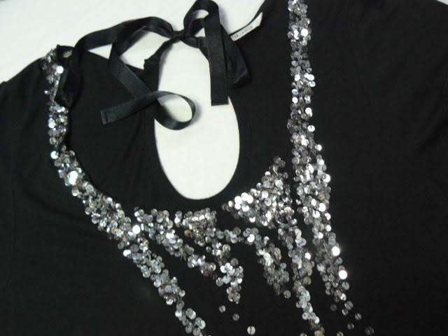 Black top with bling and back tie, size M-L