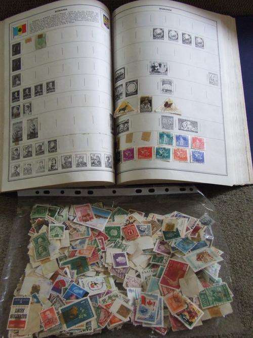 Old Ambassador album with 750+ loose stamps.