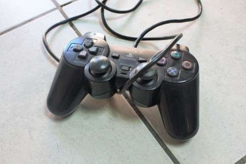 Playstation 2 + five games +controller