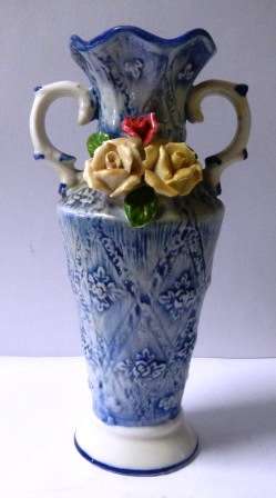 Blue and White Porcelain Amphora Shaped Vase with Rose Sculptures on.